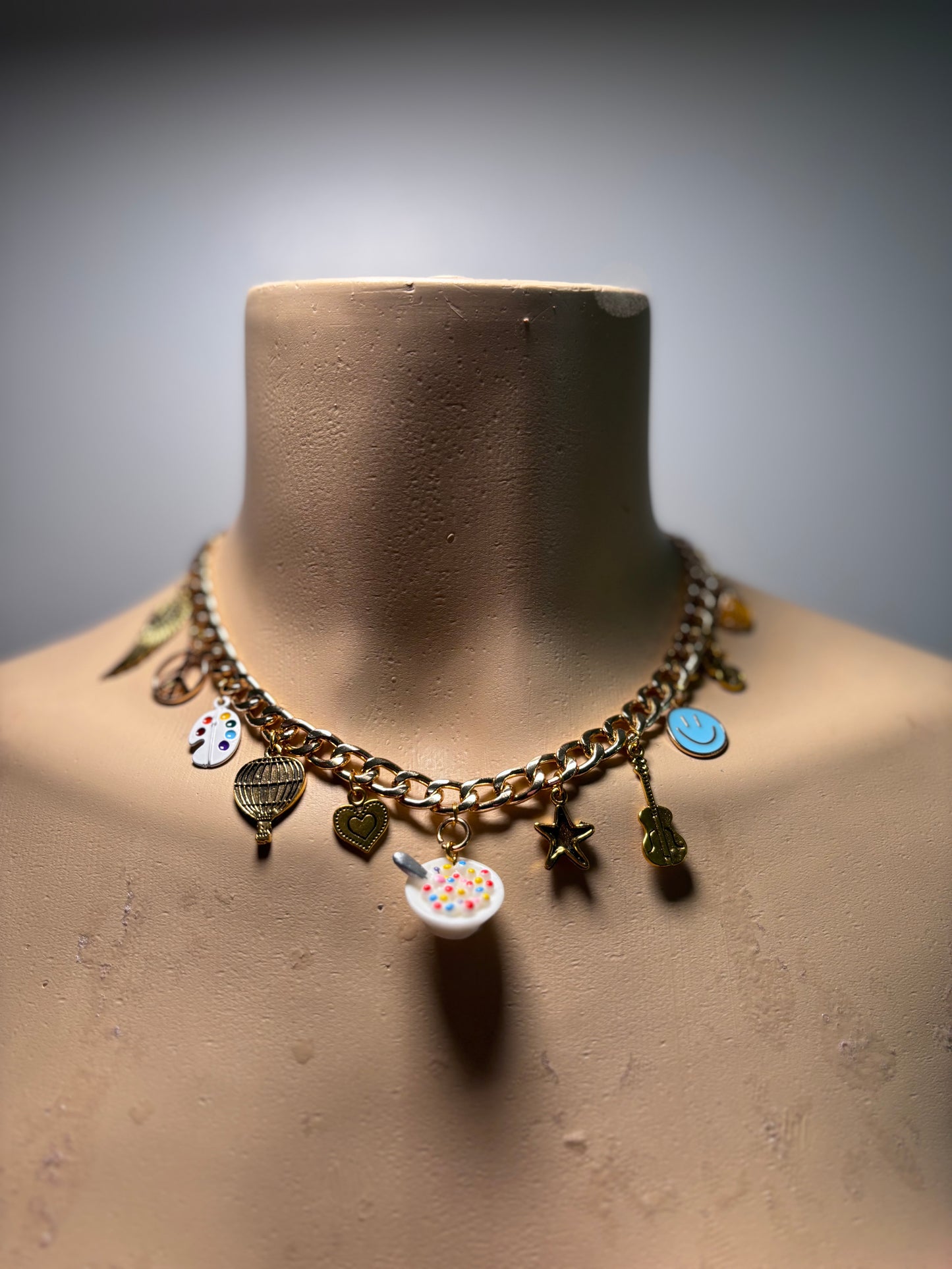 Gold charm necklace